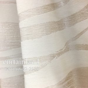 糸のきらめきが瑞々しさを表現した織物カーテン