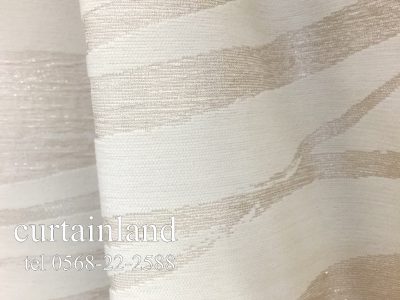 糸のきらめきが瑞々しさを表現した織物カーテン