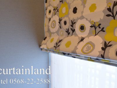 ブルー系のアクセントクロスにグレーを合わせる